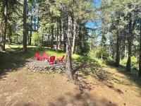 Charming 2-bedroom cabin with lake views offering a quiet, lake-side retreat.