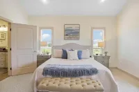 This 3 bedroom beach house is the PERFECT space to get “A Wave From It All