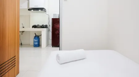 Homey 2Br at Puncak Permai Apartment