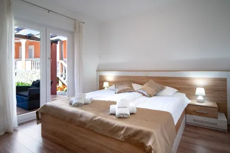 Vacation apartment A Отели в г. Rab