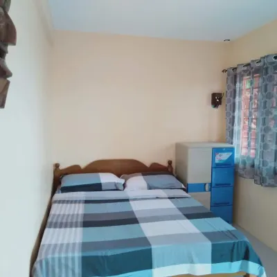 Relaxing beach side condo with mountain and island views. Hotels near Mindoro State University, Calapan City Campus