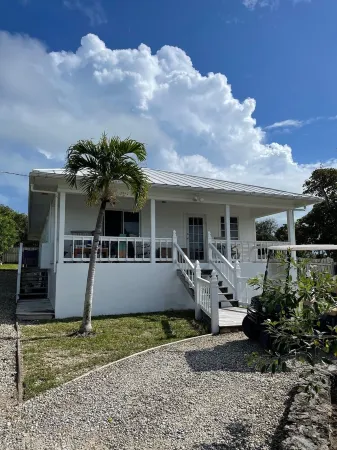 Waterfront Beach Bungalow with 150 Foot Dock on Guana Cay and Waterside Pergola