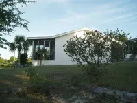 On hilltop with pool. Only 400 feet down to waterfront, dock & kayaks. Hotels in 