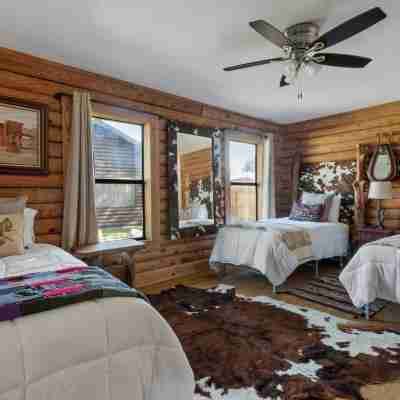 Guadalupe Bluff Log Cabin 4 Bedroom Home by Redawning Rooms