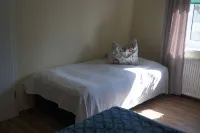 Dream location on Lake Schwerin - apartment right on the beach - 20 steps to the sandy beach