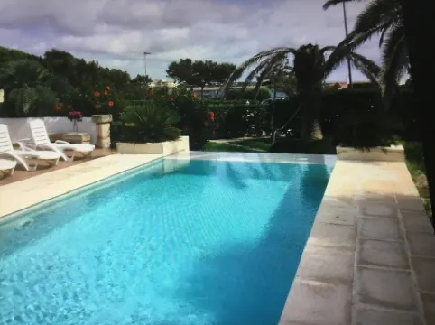 House with pool near the beach and marina