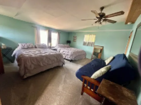 Spacious lakefront home with private dock and a panoramic view of Conneaut Lake.