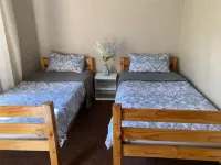 Entire 2 bedroom Duplex with wrap around garden in a secure complex