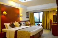 Club Emerald Hotels near BARC