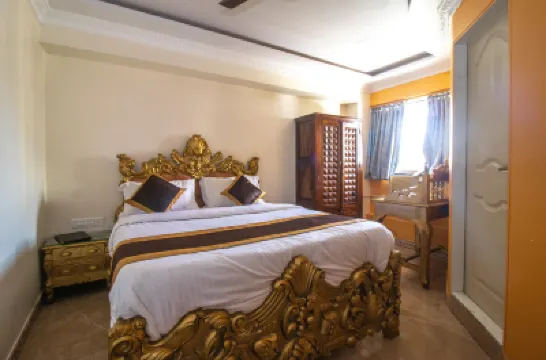 Setrac Orange Hoteles cerca de Belapur Mango Garden