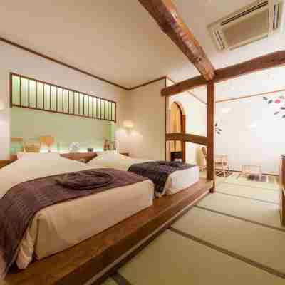 夢蔵杜高旅館 Rooms