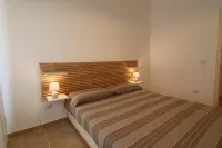 Casa Nausica — Elegant Apartment Facing the Aragonese Castle - บังกะโล