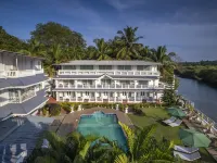 Stone Wood Riverfront Resort, Siolim Hoteles en Siolim