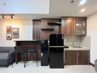 Warm and Cozy 2BR Vida View Makassar Apartment By Travelio