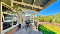 Self contained cabin in quiet coastal bushland setting. Pet friendly!