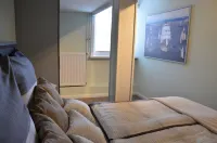 Newly built holiday apartment in a modern country house style. 10 min cycle path to the beach