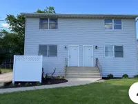Duplex overlooking Rock River Hotels in Ogle County