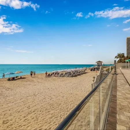Luxury Beachfront Condo • 2 Parking • Fast WiFi • Walk to Dining & Shops