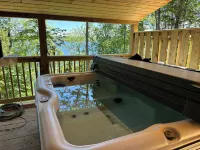 Six bedroom lake front cabin with hot tub and outdoor fire pit