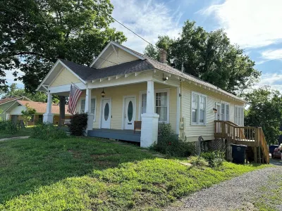 Cane River Living Downtown: walk to Front Street, across from the events center
