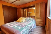 The Woodland Hideout by the Lake Features a Private Hot Tub and Sauna