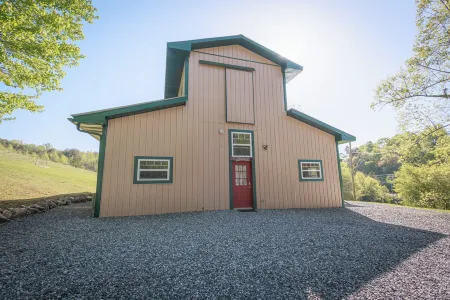 Beautifully renovated Horse Stable on 14 mountain acres walking distance to town