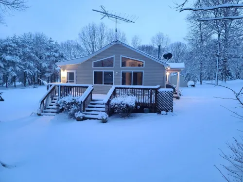 GO JUMP IN THE LAKE at this lovely waterfront home!