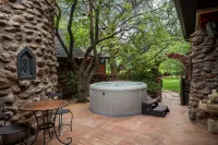 Creekside Chateau,patio overlooks Oak Creek, with steps directly to the water