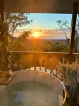 Bathtub with a View at Cockatoo Cabin Hotel a Mudgeeraba