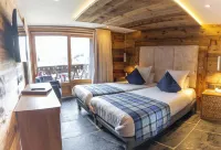 Hôtel Alpina & Spa - Restaurant Oxalis - Parvekkeita
