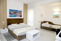 Lo Studio di Viale Lo Re Camere & Caffe’