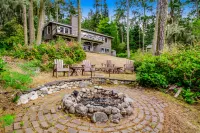 Dog-friendly waterfront home with furnished deck, patio & beach access