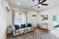 Lower-level dog-friendly home with a porch, AC, parking & washer/dryer