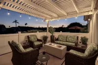 Spacious Deck with Peek-a-Boo Water Views - Exquisite Coastal Haven