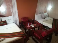 Alpine Hotel Hotels near Wa Mumbi Wimbi Store