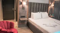 Talles City Hotel فنادق في 