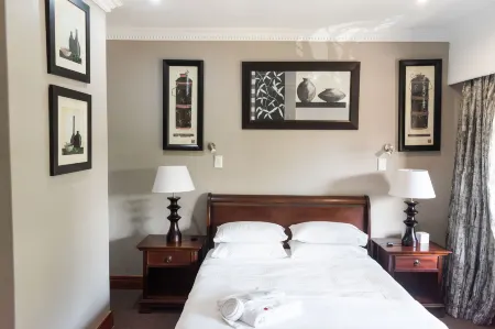 Aanmani Rose Guesthouse Отели в г. Цване