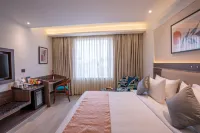 โรงแรม Regenta Inn Gurugram