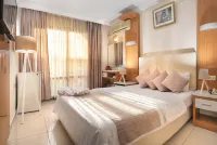 Temple Hotel Hotel dekat Stadyum