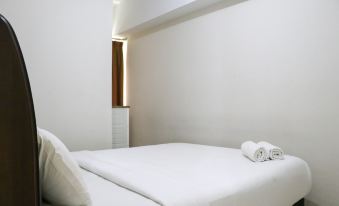 Tranquil Designed and Homey 2Br at Springlake Summarecon Bekasi Apartment