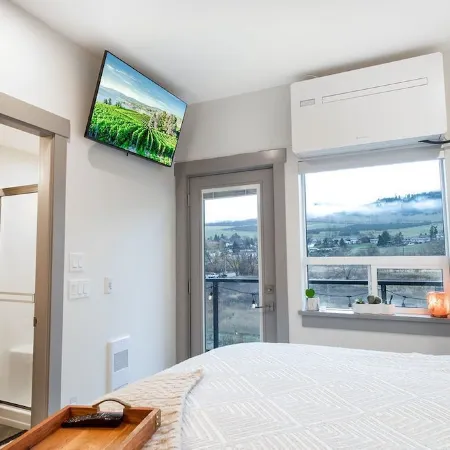 Lake Okanagan Beach Condo w/ Private Buoy, AC, Heated Outdoor Pool, Patio, Sups