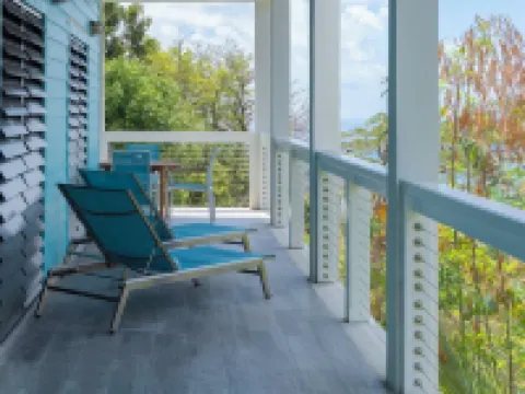 Verandah-style Living Overlooking Coral Bay Hotels in Central