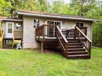 Think Spring! Book now for fishing, campfires and boating on Mystery Lake! Hotels in Scott