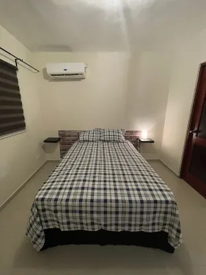 Minimalist 2-Bedroom 3FL loft Apt 20 mins from SDQ 哥倫布燈塔附近的飯店