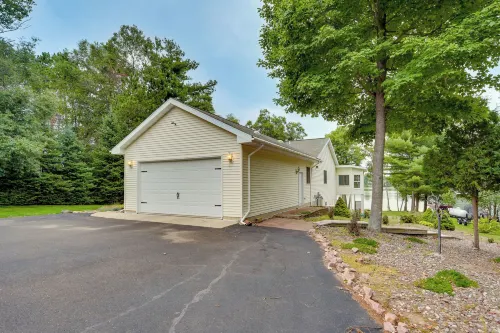Spacious Lakefront New Auburn Home w/ Sunroom - parking