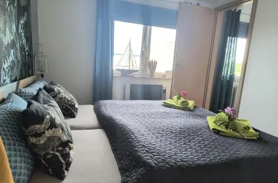 FH with Garden, Playground, Sauna, Fitness, 2 Bedrooms, Kitchen with Dishwasher Hotels in 