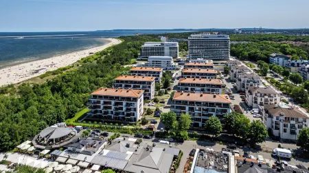 Plaża I, Sun & Snow Отели рядом с достопримечательностью «Свиноуйсьценский маяк»