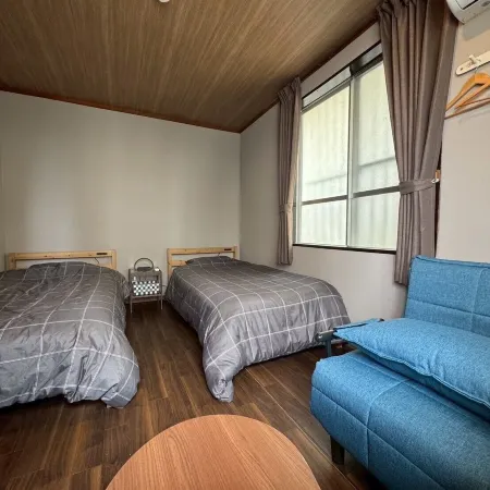 Ishigaki guesthouse OHANA - Hostel Отели рядом с достопримечательностью «Пляж Фусаки»