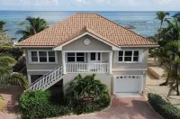 Coco Kai Beach Front Villa with Heated Pool and Private Dock