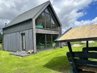 Gemütliches Holzhaus mit Garten nah am Wasser, Hundefreundlich Hotels in Nowe Warpno